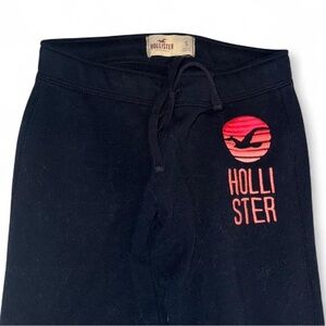 2016 women’s Hollister Navy Joggers with Pink Logo